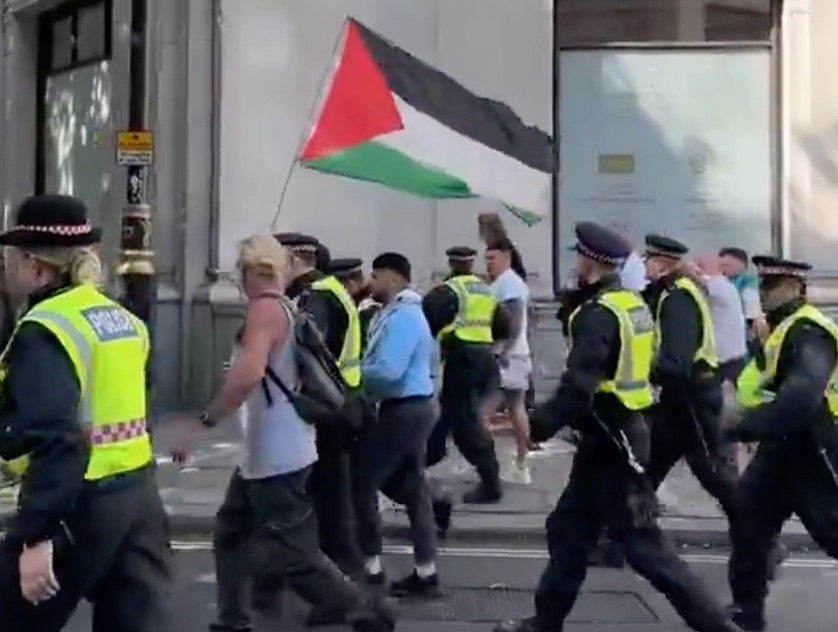 Police escorting Al-Mail